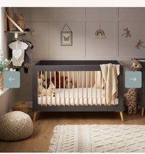 Obaby Adjustable Maya Cot Bed with moisture management mattress.