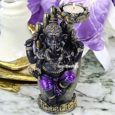 Ganesh In Hand Lotus Flower