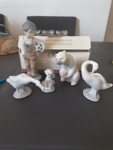 Four lladro figurines - ,