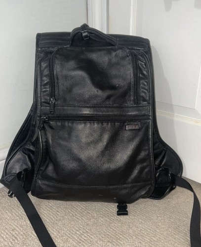 Tumi black leather - black,