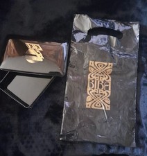 Two Biba  tins with small