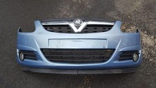 VAUXHALL CORSA D PRE-FACELIFT FRONT BUMPER + GRILLE AIR BLUE 21C/4MU 2006-2010