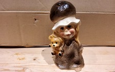 Young Girl Hugging Teddy