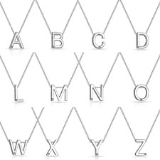 Initial Necklaces Created with Zircondia® Crystals by Philip Jones