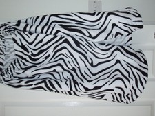 Wrap aroud towel in animal print with elasticated and stick together top