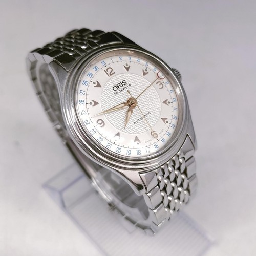 Oris big crown - big, pointer