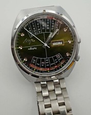 LUCH Vintage Soviet Calendar Watch. Goes & stops - tap glass & it starts again!?