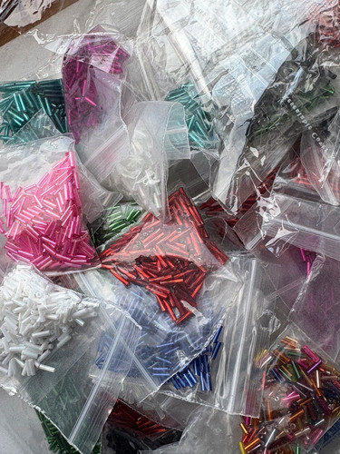 Approx 50g 1250 bugle beads - approx.,