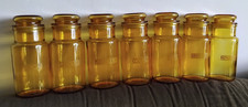 VINTAGE SET OF 7 AMBER GLASS FRENCH STORAGE AIR TIGHT JARS 7" TALL