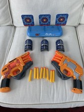 Two Nurf Guns With Bullets, Battery Operated Shooting Target, Three Half Cans