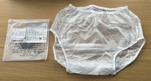 Pair plastic pants in - pair,