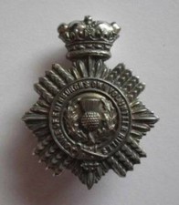BRITISH ARMY CAP BADGE. THE