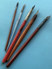 FIVE OLD DIP PEN HOLDERS WITH NIBS, VARIOUS SIZES