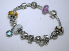 PANDORA 7 3/4" WRIST BRACELET WITH 13 CHARMS - USED - BEST OFFER