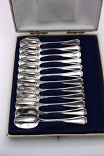12 Italian 800 Silver Spoons