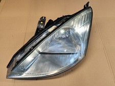 FRONT LEFT HEADLIGHT FORD