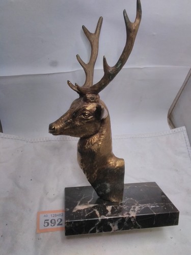 Brass stags head ornament - brass,