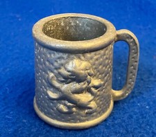 Small pewter measuring