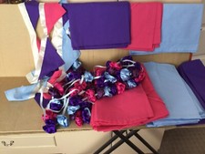 12 lg Table Runners ,9small  Purple, pink , blue. Bunting and rosettes to match.