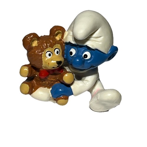 Smurf baby holding teddy - smurf,