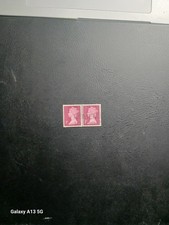 Queen Elizabeth pair of 1 pence stamps
