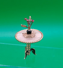 VINTAGE DOLLS' HOUSE - ANTIQUE GERMAN METAL ORNATE TABLE WITH VASE OF FLOWERS