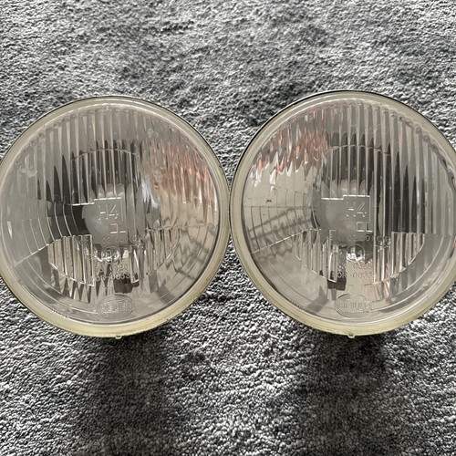 Two hella vintage headlamps - hella,