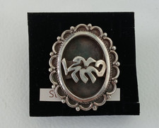 Heavy silver arabic hallmarks and arabic writing ring UK size M and weighs 18 gr