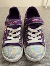 Heelys Size 1/33 purple and silver, in vg used condition, with tool and box
