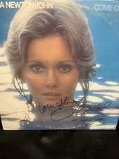 Olivia Newton John signed autographed W/COA from "IN PERSON AUTHENTICS!!"