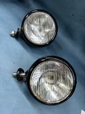 pair of vintage car headlights