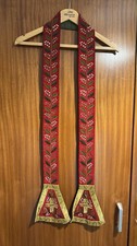 Red stole with - with, embroidered