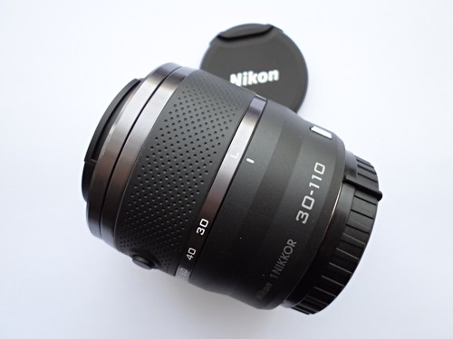 100 mint nikon - 100%,