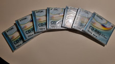 Seven (7) TDK CD-R80 Recordable CDs still in shrink-wrap packaging