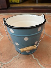 small, light blue metal pail