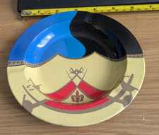 A TIN PLATE ASHTRAY - WHICH I CAN'T FIND ANYTHING ABOUT THE DESIGN OR MAKER