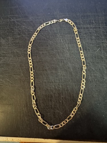 9kt below figaro chain - 9kt, or
