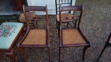A Beautiful Pair Of Rosewood Regency Chairs With Cane Seats