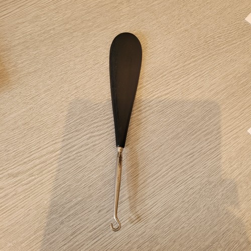 Ebony shoe horn and steel - and,