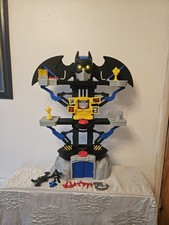 Imaginext Transforming Batman Batcave with Lights and Batman Figure.