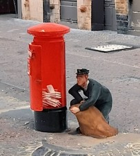 FG07 Postman and Open Post Box