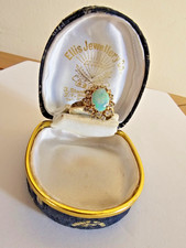 Gold opal and diamond ring