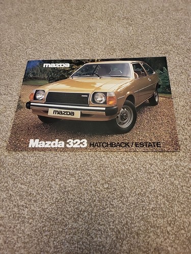 Mazda 323 car brochure circa - car,