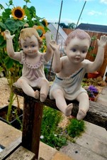 Bisque antique Piano Babies