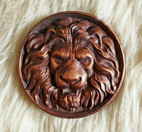 Carved lions head solid - lions,