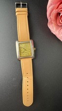 Terner Quartz Analog Watch With A Gold-Toned Face And A Tan Leather Strap