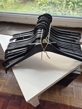16 Black Plastic Clothes Hangers See Pictures for Dimensions. Good Condition
