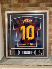 LIONEL MESSI ICONS UCL SIGNED AND FRAMED BARCELONA SHIRT WITH PROOF