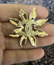 Vintage Chanel Brooch yellow gold gilded on metal with crystal. Mint condition 
