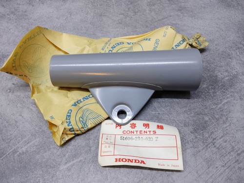 Gray headlight bracket - bracket, left